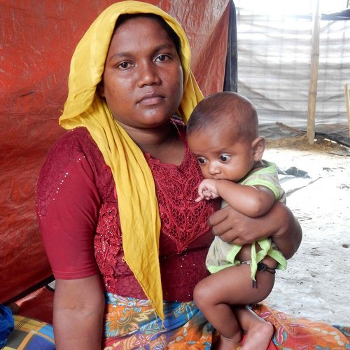 Khadija, eine geflüchtete Rohingya-Frau aus Myanmar Khadija, eine geflüchtete Rohingya-Frau aus Myanmar