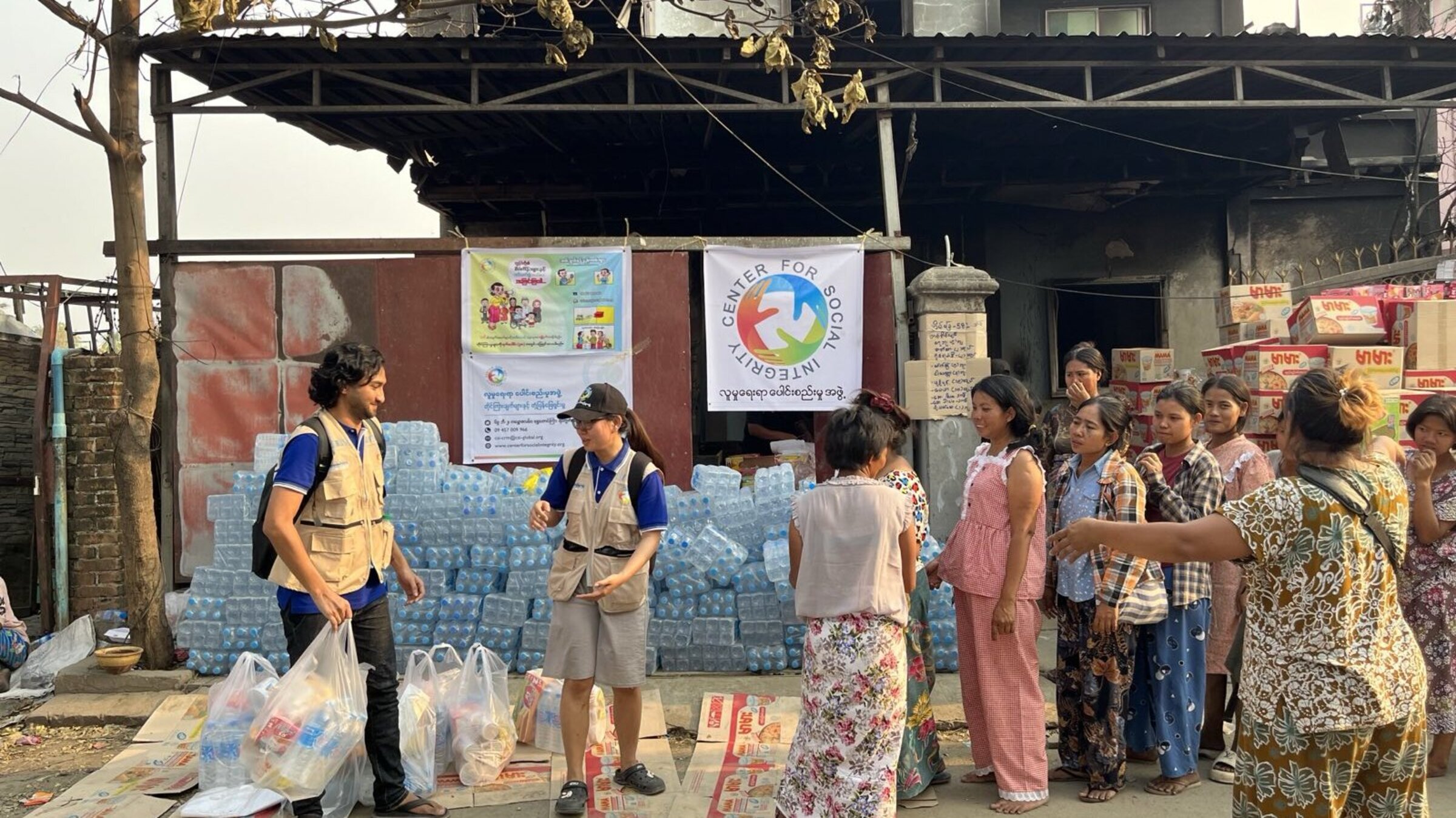 Emergency aid team distributes drinking water to those affected by the earthquake in Myanmar