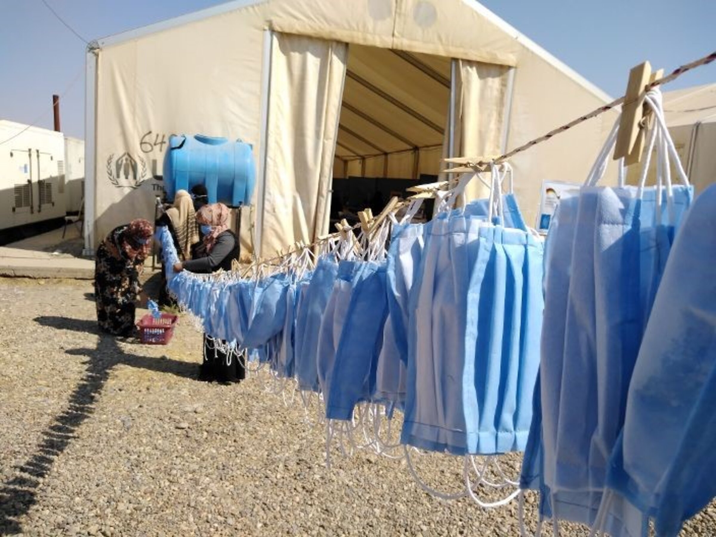 Spenden Irak Corona: Über 400.000 Masken werden produziert